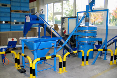 CONFLUX tumbler screening machine in a technical center