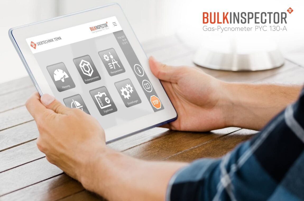 One person operates the BULKINSPECTOR pycnometer using a tablet and the start menu is displayed. Here you can choose whether you want to carry out a measurement, set the sample or measurement parameters, calibrate the device, display the results or change general settings.