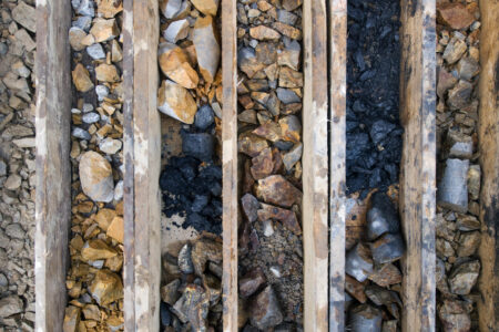 Different core samples - you can see different broken core samples from core drillings in a sorting box